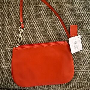 Coach brand new orange wristlet